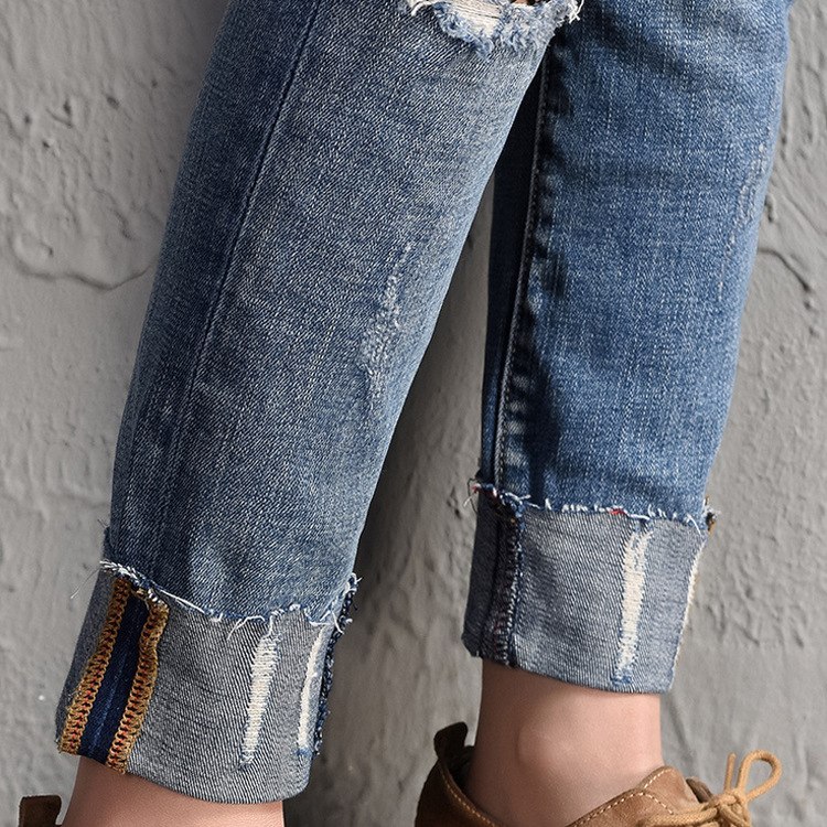 Fashion-hole-flanging-gauze-ladies-casual-jeans