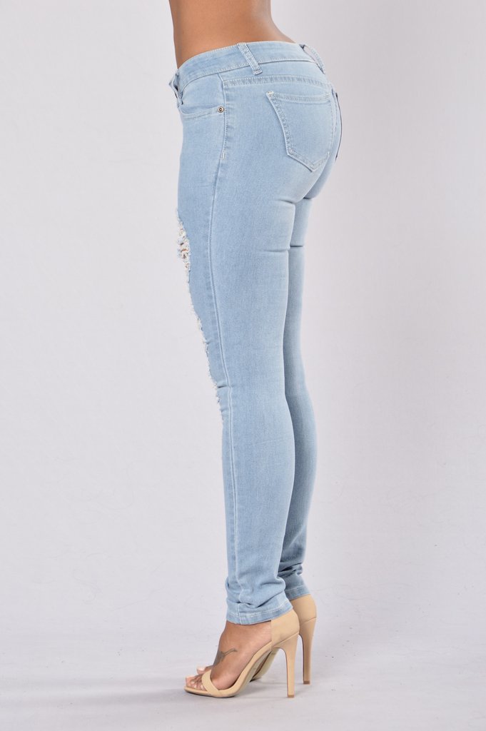 Wholesale-fashion-hole-elastic-jeans-leggings-woman