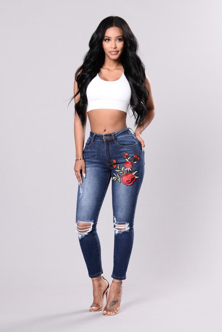 Wholesale-fashion-hole-embroidery-stretch-jeans-woman