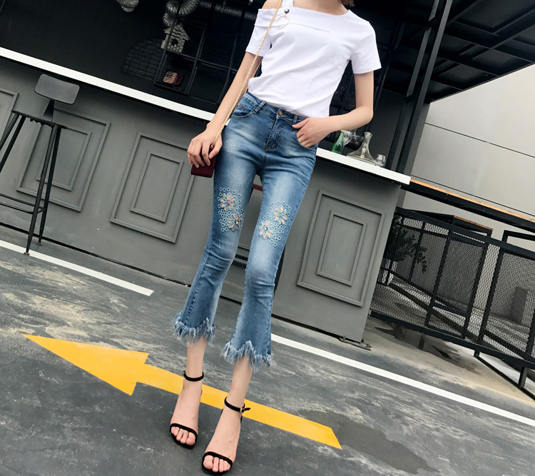 Wholesale-flower-embroidery-hollow-out-tassel-micro-flared-jeans